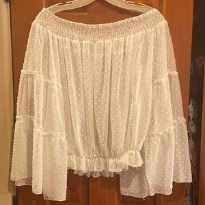 Off-the shoulder, sheer peasant top